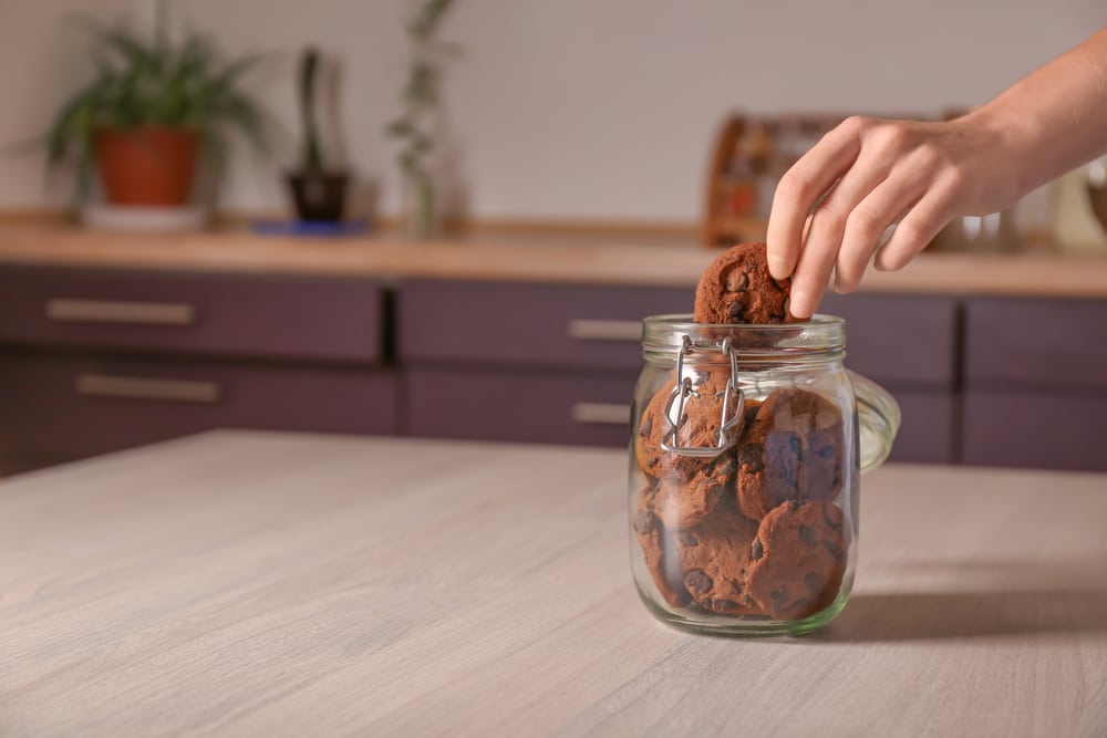 Hand in cookie jar