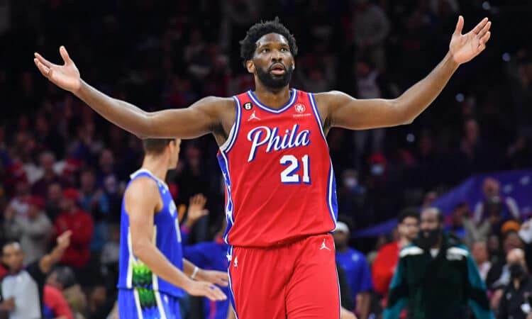 joel embiid arms outstretched